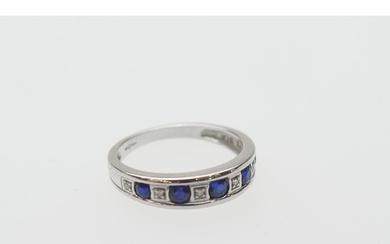 Synthetic sapphire and diamond half eternity ring, in 9ct wh...