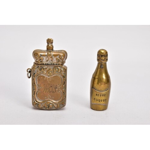 TWO BRASS VESTA CASES, the first in the form of a 'Veuve Cli...