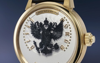 Thomas Prescher, A whimsical and surprising yellow gold "bras en l'air" double retrograde wristwatch, on-demand time indication, hand engraved eagle automaton, guarantee and box