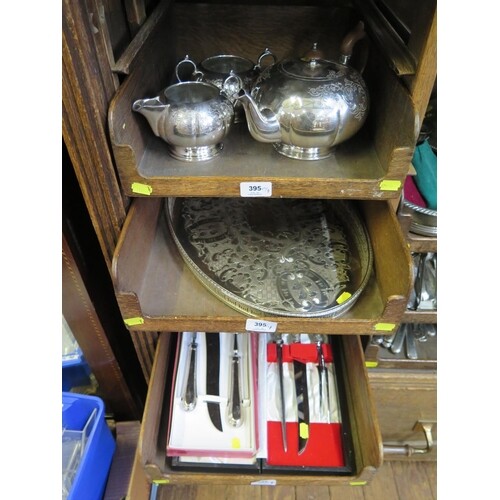 Three trays of silver plate comprising a three piece tea set...