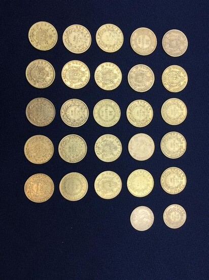 Twenty-five 20-franc gold coins and two 10-franc gold...