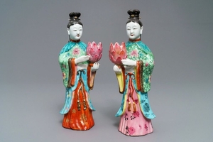 Two Chinese famille rose candle holders modelled a…