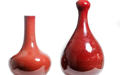 Two Chinese monochrome red-glazed vases Mid Qing dynasty The first, thickly potted...