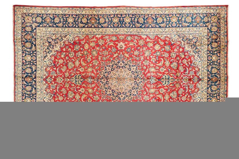 Very important Esfahan najafabad. ( iran ) circa 1980 Dimensions. 510 x 345 cm Technical specifications. Wool velvet on cotton foundations Good general condition Density approx. 7000 knots per dm2 Ruby field with foliage and garlands of flowers...
