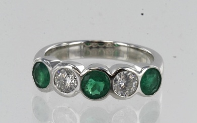 White gold (tests 18ct) diamond and emerald five stone ring,...