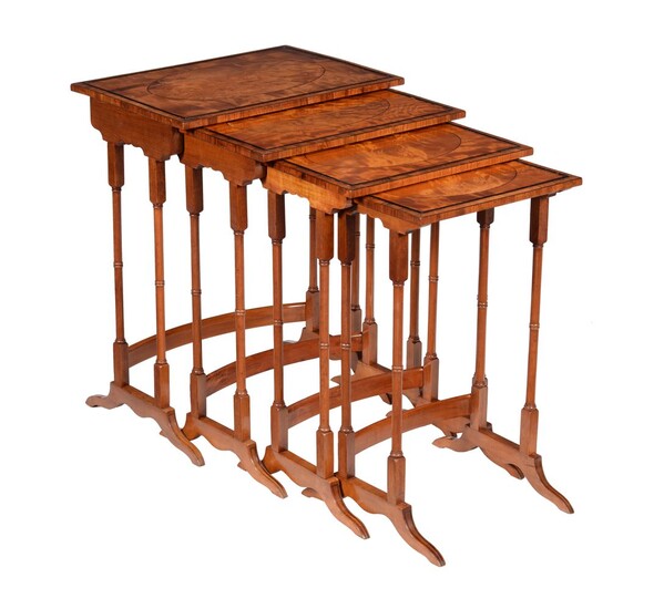 ? A nest of satinwood, ebonised, and rosewood banded quartetto tables, second quarter 19th century