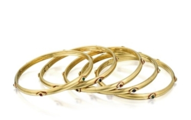A Group of 14K Gold Multi-gem Bracelets