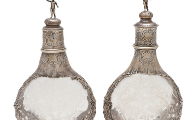 3284996. A PAIR OF LATE 19TH/ EARLY 20TH CENTURY GERMAN SILVER MOUNTED DECANTERS.