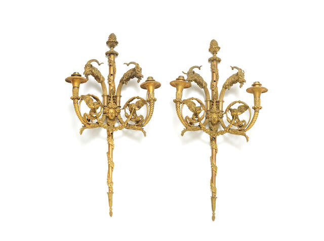 A pair of late 19th / early 20th century French gilt bronze twin light wall appliques