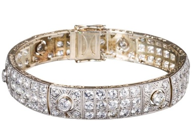 A 14ct gold and diamond bracelet (approx. 9.92ct)