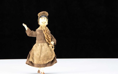 A 19th century Grodnerthal dolls’ house cook doll