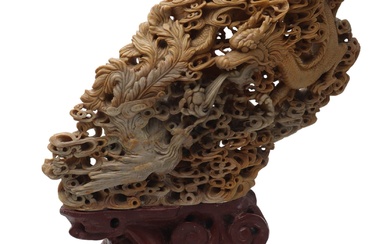 A 19th/20th century Chinese carved soapstone depicting a dragon