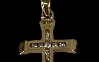 A 9ct yellow gold diamond set cross pendant, approx 2g.Condition...