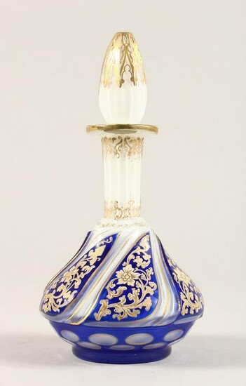 A BOHEMIAN OVERLAY GLASS SCENT BOTTLE AND STOPPER.