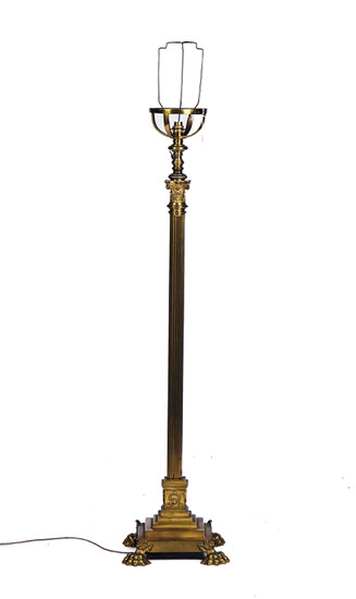 A BRASS HEIGHT-ADJUSTABLE STANDARD LAMP