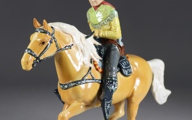 A Beswick Pottery American Mounted Cowboy, designed by Graham...