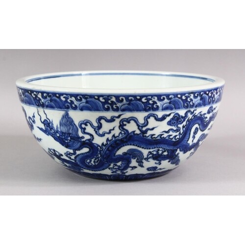 A CHINESE MING STYLE BLUE & WHITE PORCELAIN DRAGON BOWL - th...