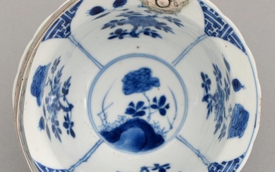 A Chinese blue and white bowl, Kangxi period, painted with a...
