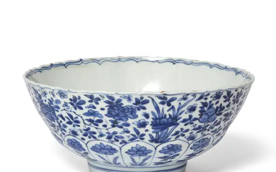 A Chinese blue and white moulded 'floral' bowl Qing dynasty, Kangxi period...
