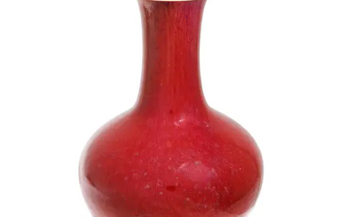 A Chinese flambé-glazed bottle Qing dynasty, 18th/19th century The thickly-potted vessel...