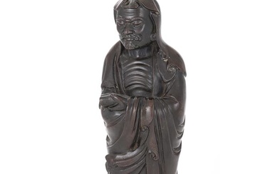 A Chinese silver inlaid bronze figure of Damo