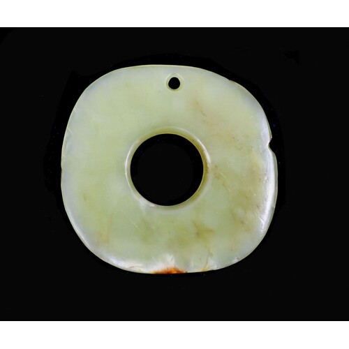 A Chinese yellow jade bi disc, possibly Hongshan Culture, wi...