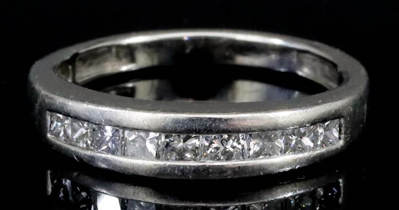 A Diamond Half Hoop Eternity Ring, Modern, in platinum...