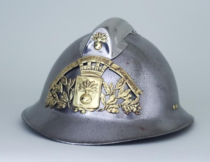 A French Steel Fireman's Helmet with brass crest -...