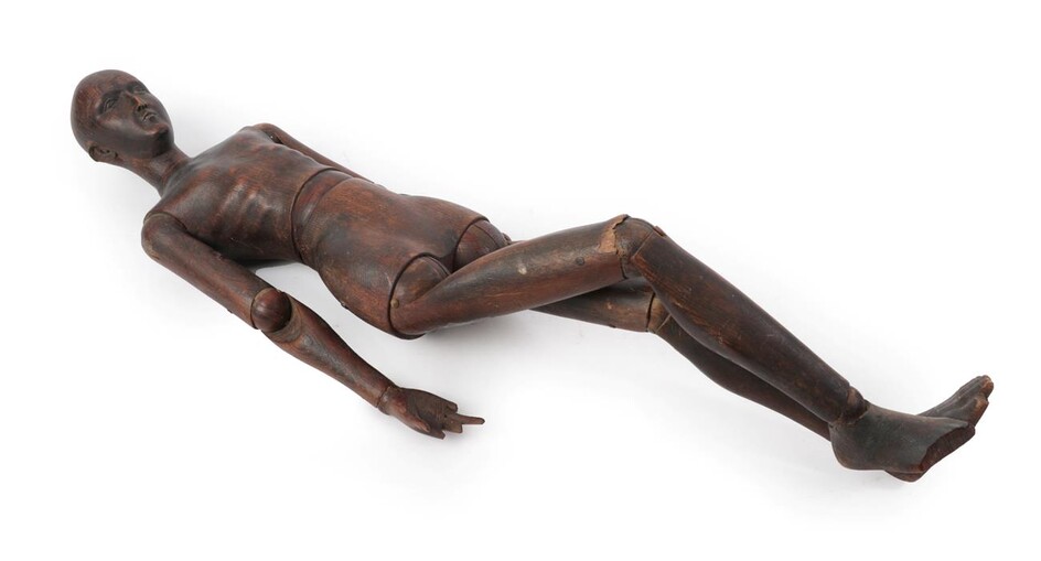 A French Walnut Artist's Lay Figure, late 19th century, naturalistically carved with...