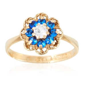 A GEMSET CLUSTER RING in yellow gold, comprising of