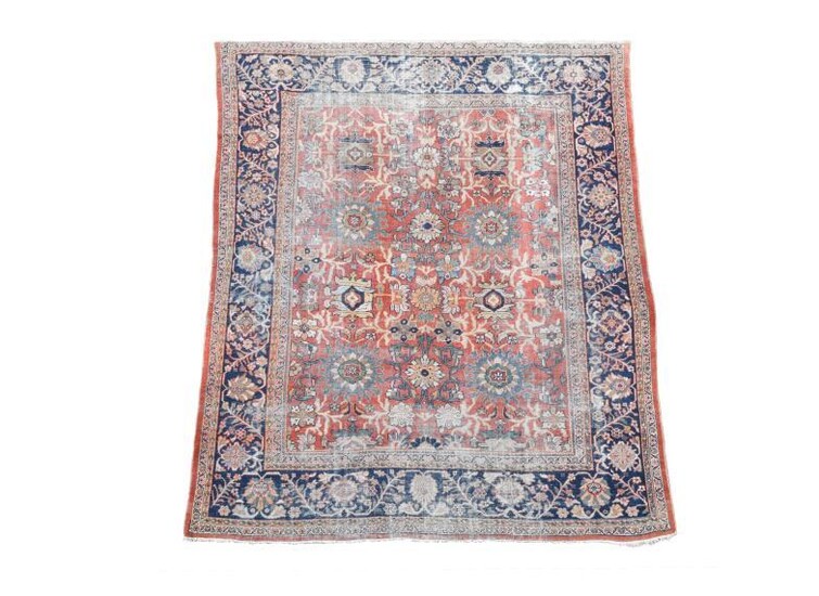 A Heriz carpet, circa 1920, of typical design of...