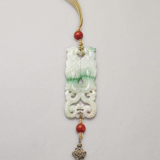 A JADEITE ‘DOUBLE-PHOENIX’ PENDANT, LATE QING DYNASTY, 19TH-EARLY 20TH CENTURY