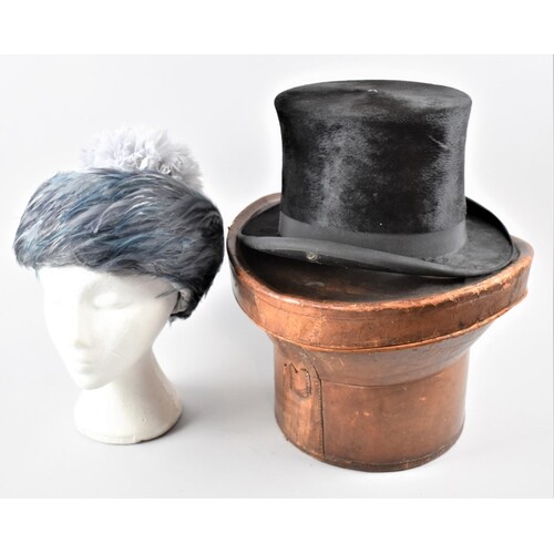 A Late 19th Century Leather Top Hat Box Containing Distresse...