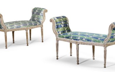 A PAIR OF GEORGE III CREAM-PAINTED AND PARCEL-GILT WINDOW BENCHES...