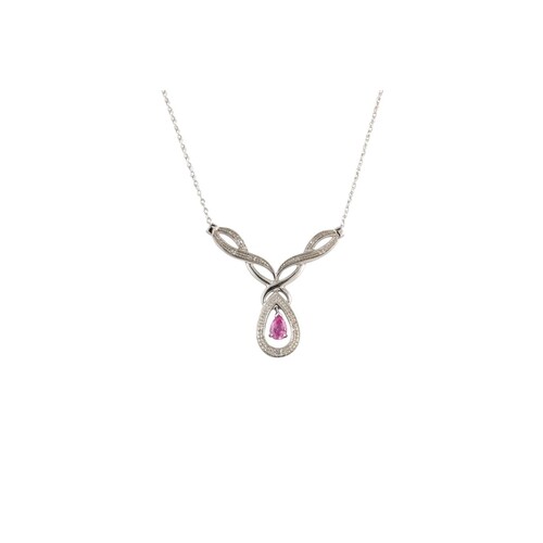A PINK SAPPHIRE NECKLACE, mounted in white gold on a chain