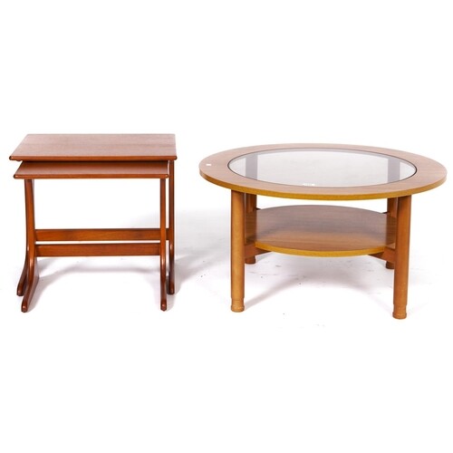 A Schreiber teak coffee table, c1970's, with inset glass cen...
