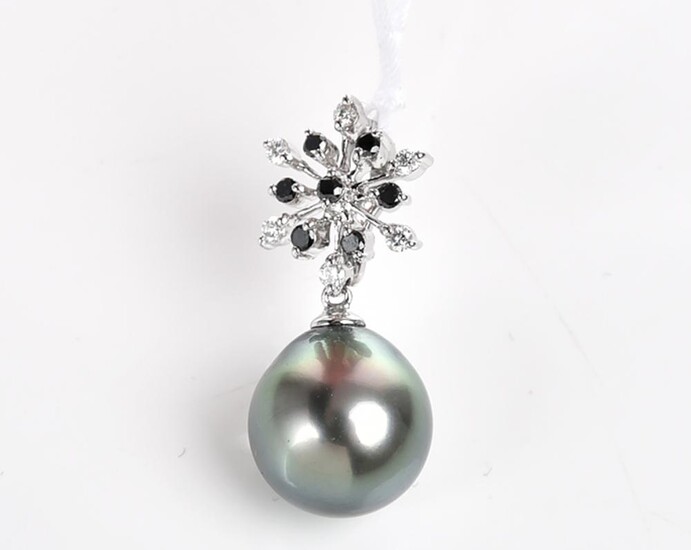 A TAHITIAN PEARL (11.60MM) SUSPENDED BELOW A BLACK AND WHITE DIAMOND SURMOUNT, IN 18CT WHITE GOLD BY AUTORE