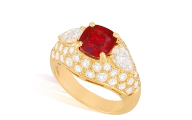 A VERY FINE RUBY AND DIAMOND RING, BY BULGARI The cushion-s...