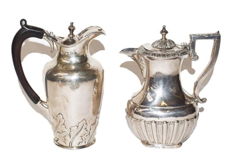 A Victorian and A George V Silver Hot-Water Jug, the...