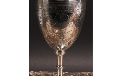 A Victorian silver pedestal goblet, bright-cut engraved with...