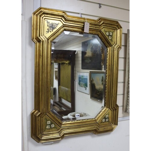 A Victorian style painted gilt framed wall mirror, width 68c...