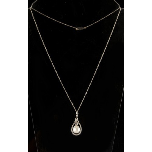 A certificated natural saltwater pearl & diamond pendant on ...