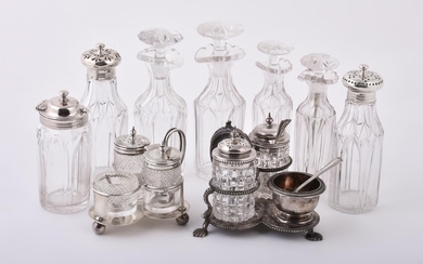 A collection of silver mounted cruet items