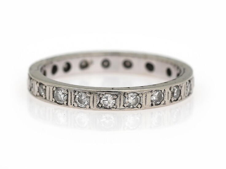 SOLD. A full diamond eternity ring set with numerous single-cut diamonds, mounted in 14k white...
