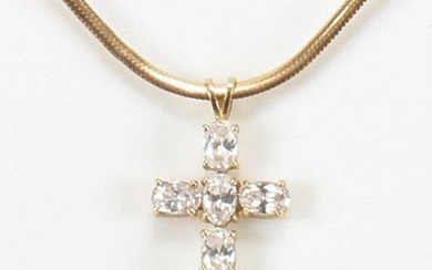 A hallmarked 9ct gold and gem set CZ cross pendant necklace....