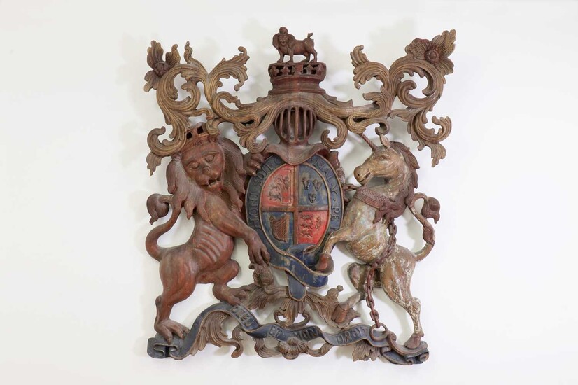 A large carved and polychrome painted Royal Coat of Arms of the United Kingdom