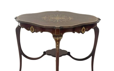 A mid century Italian walnut quatrefoil centre table with bone and fruitwood inlay.