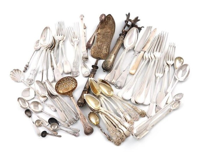 A mixed lot of French and English silver flatware, various dates and makers, comprising: five table forks, eight dessert forks, seven dessert spoons, a sifting spoon, a butter knife, three pairs of sugar tongs, twelve French teaspoons, five grapefruit...