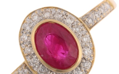 A modern 18ct gold ruby and diamond oval cluster ring, rub-o...