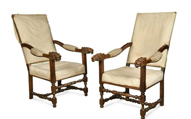 A pair of Continental walnut throne armchairs, early 19th century